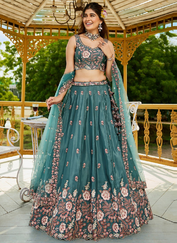 Party wear Peacock colored Satin fully embroidered lehenga choli with sequin zari work.